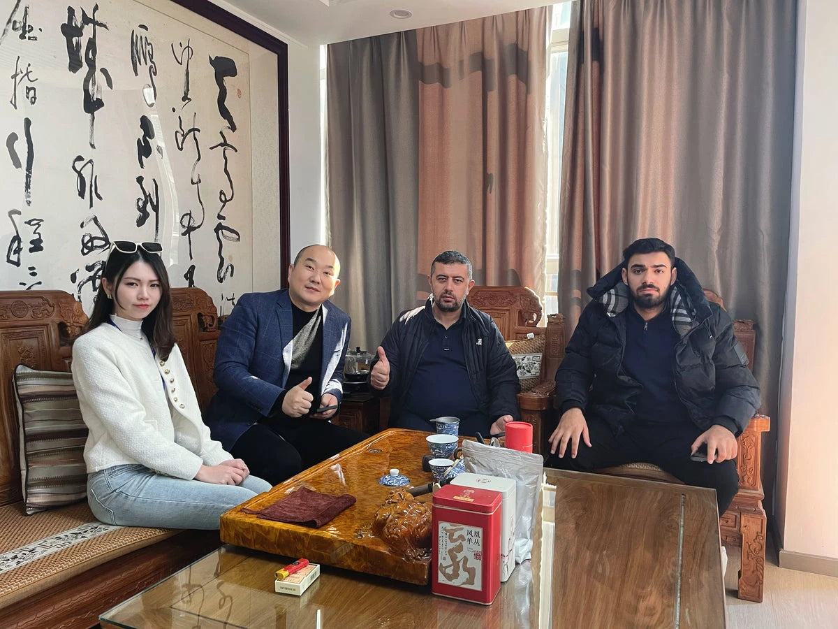 Anern representatives meeting with visiting partners at a table